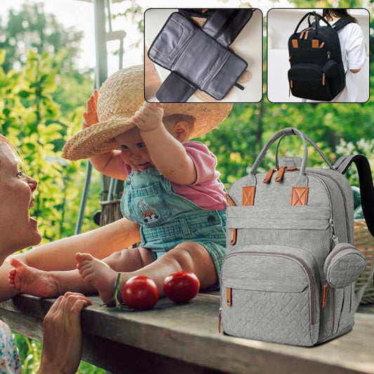 mere avec bebe sac a langer