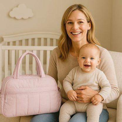 Sac a langer avec maman bébé qui sourit
