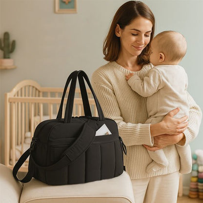 Sac a langer noir avec maman et bébé qui se regarde